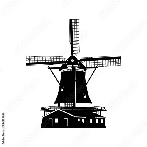 Silhouette of a traditional dutch windmill with four blades rotating isolated on white background