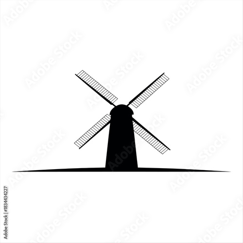 Silhouette of a traditional windmill with rotating blades