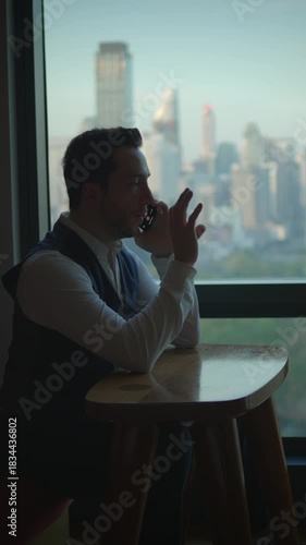 Wallpaper Mural urban professional speaking during daytime, man engaged in business conversation at window seat Torontodigital.ca