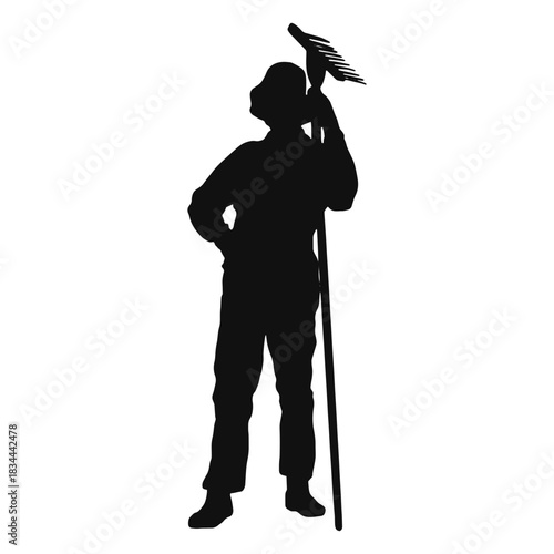 Farmer holding rake silhouette
