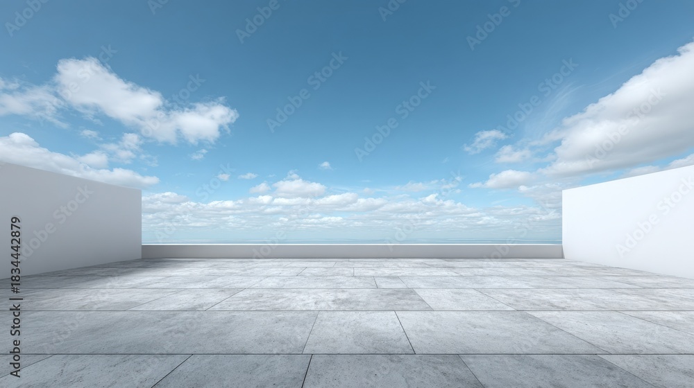Fototapeta premium Minimalist Concrete Terrace Overlooking Ocean with Clear Blue Sky and Clouds Offering Open Space for Creative Concepts
