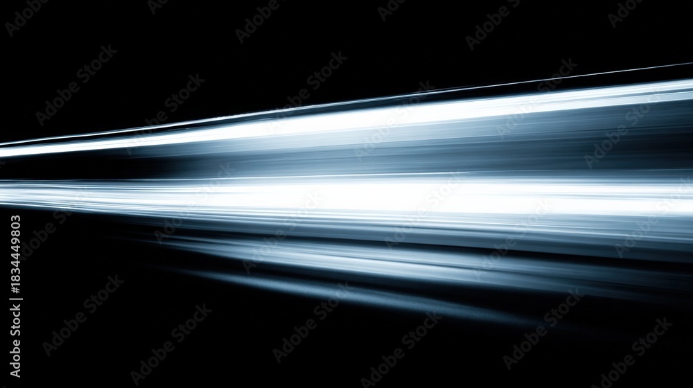 Fototapeta premium Dynamic Abstract Light Trails on Black Background, Representing High Speed and Movement