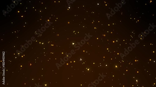 Abstract Background With Golden Floating Particles And Warm Glow.