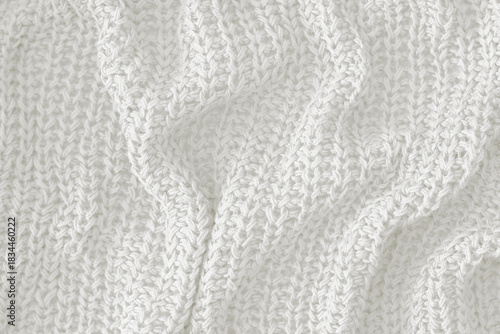 Cloud dancer toned colour monochrome texture knitted fabric. Knitted Jersey as textile background. Monochrome color background. Wool knitting texture. Trendy color 2026.
