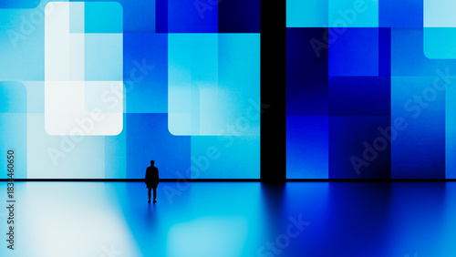 Silhouette of a man against a digital blue geometric background