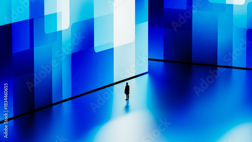 Silhouette of a man against a digital blue geometric background