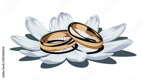 Two golden rings resting gracefully upon a flower.