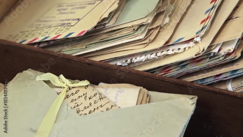Old postal paper letters in the wooden box. Stamp on the envelope: 