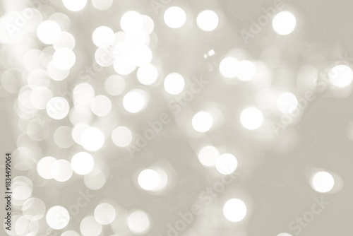 Abstract sparkling white light bokeh creating a soft, blurred background, perfect for celebrations or festive designs. Color of 2026 year dancer in the white cloud