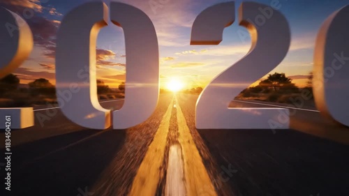 Road paved to year 2026 sunset horizon journey concept
