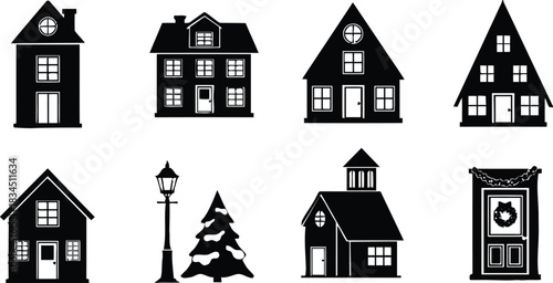 Silhouette christmas village collection of houses church and streetlight