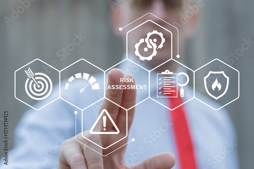 Business person using virtual touch screen presses the words RISK ASSESSMENT. Risk Assessment Business Financial Management concept. Risky evaluation.