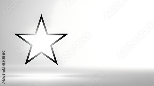 Black star silhouette on light background with soft shadows  