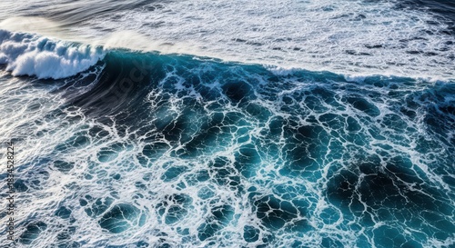 Fototapeta Naklejka Na Ścianę i Meble -  Powerful ocean wave breaking with foamy white patterns on deep blue water