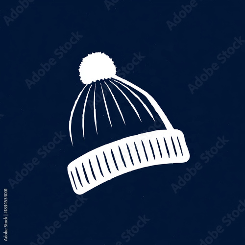 Winter Knit Cap with Pom Pom Isolated on Dark Blue

