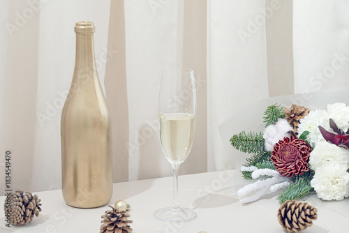 Holiday Table with Champagne and Christmas Decorations. 