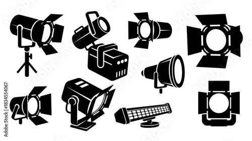 Collection of black silhouette icons depicting various professional stage and studio lighting equipment, including spotlights, floodlights, and projectors for theater or film production