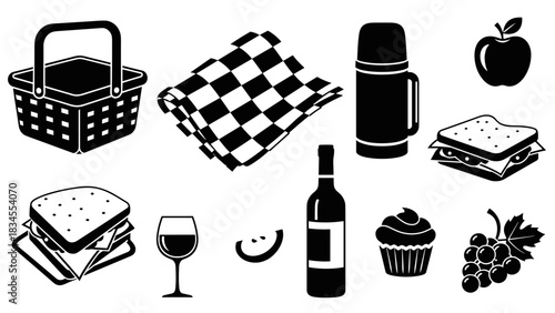 Set of black picnic icons featuring a basket, sandwich, wine, fruit, and thermos in a simple silhouette style for graphic design and illustration projects