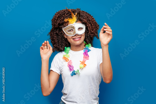 Brazilian carnival: woman with mask and glitter accessories