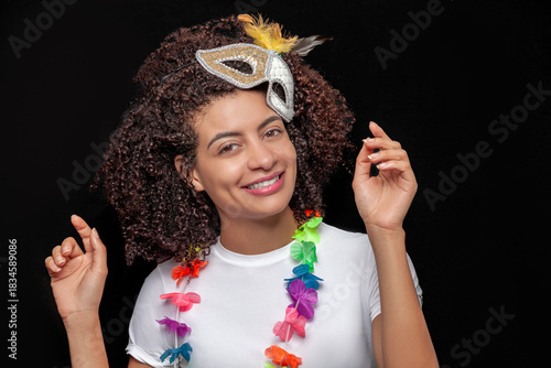 Festive portrait of Latina woman with carnival accessories