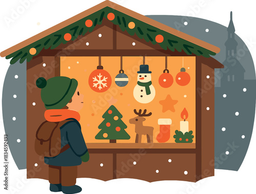 A little boy gazes at Christmas decorations in a shop display on a winter evening, while a tourist examines Christmas toys and accessories at Tallinn's traditional market