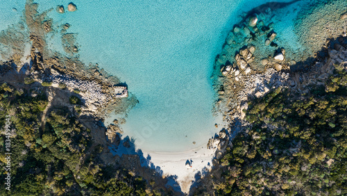 Fototapeta Naklejka Na Ścianę i Meble -  Aerial view of a hidden bay on the coast of Villasimius, Sardinia, Italy, Europe