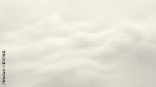 Abstract cream color cloud background with soft and gentle texture. Cloud dancer color palette concept for backdrop or design element.