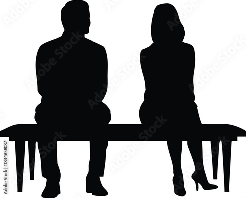 Man and woman silhouetted sitting on a bench illustrate disconnection, separation, or perhaps reflection in solitude.
