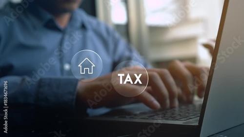 Businessman using a computer to complete Individual income tax return form online for tax payment. Government, state taxes