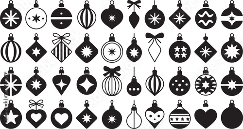Black and white Christmas ornaments displayed over a plain white backdrop form a delightful collection