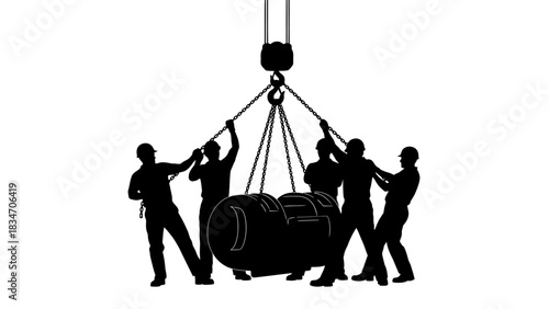 Team of workers lifting a heavy load with a crane, symbolizing collaboration and industrial effort
