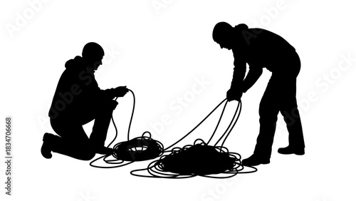 Two people working together with ropes and cables on a white background