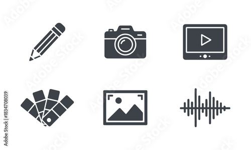 Set of six dark gray flat design icons representing creative media production tools like a pencil, camera, video player, color swatch, image placeholder, and sound wave