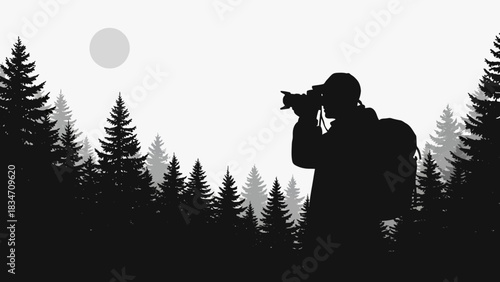 Silhouette of a photographer with a backpack taking a picture in a dense pine forest under a bright moon or sun.