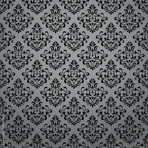 Wallpaper in the style of Baroque. Gray and black floral ornament. Seamless vector background. Graphic pattern for fabric, wallpaper, packaging. Ornate Damask flower illustration