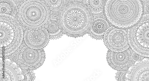 Intricate black and white mandala arch design with a central copy space, ideal for coloring books or decorative backgrounds.
