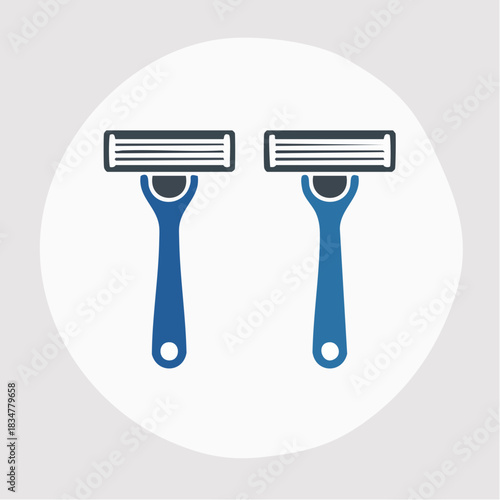 Two blue razors for shaving in a white circle on a gray background.
