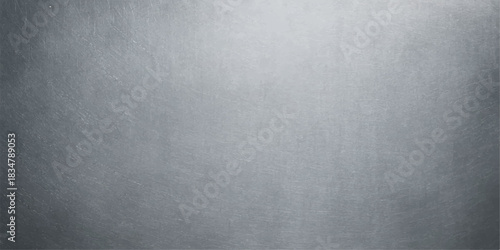 A dark grey brushed metal plate texture with a grunge aged surface and rough vintage pattern for a black industrial backdrop design