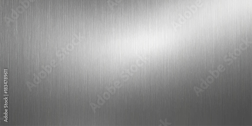 Brushed silver aluminum metal texture pattern plate with reflection and light surface wallpaper backdrop