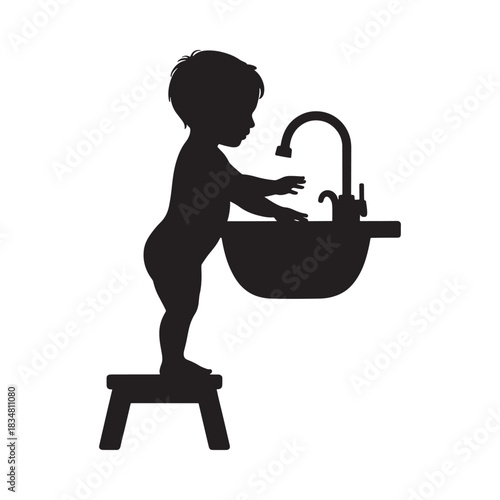 Child washes hands at sink on stool silhouette