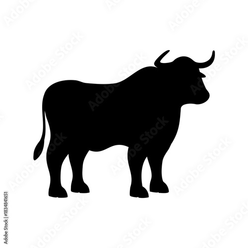 Silhouette of a Strong Bull with Horns Standing Tall and Proud