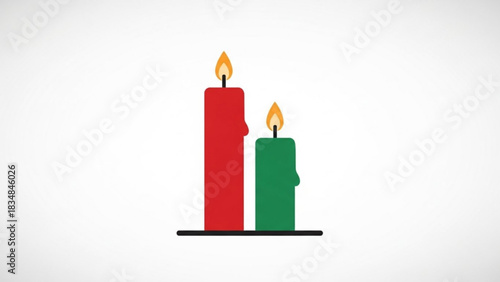 Two lit kwanzaa candles one red and one green stand side by side on a black candle holder against a clean white background symbolizing unity and celebration