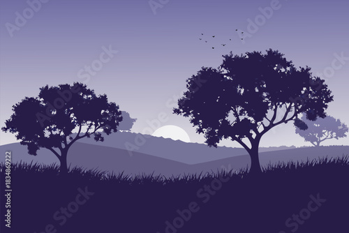 a silhouette of trees hills and a rising or setting sun in