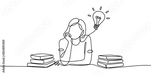 a person studying with books and having a bright idea, symbolizing learning, creativity, and inspiration.