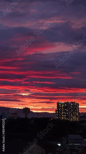 Wallpaper Mural Timelapse of colorful dusk and clouds above Bandung skyline Torontodigital.ca