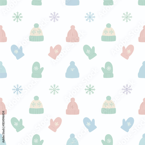 Seamless pastel winter clothing pattern with hats and mittens