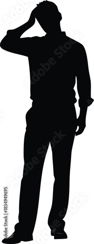 a silhouette of a man standing with his hand on his head