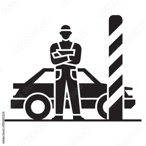 Mechanic standing in front of car lift