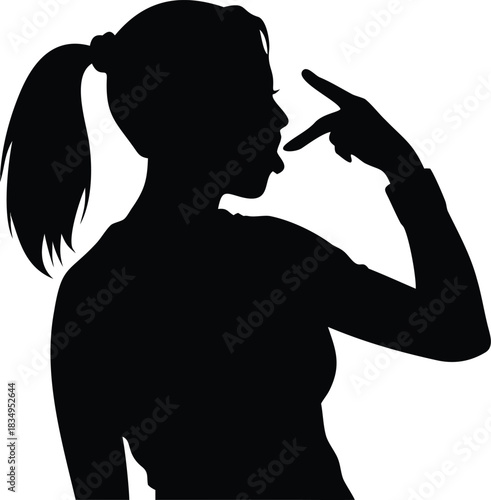 a silhouette of a woman with a ponytail pointing towards the viewer