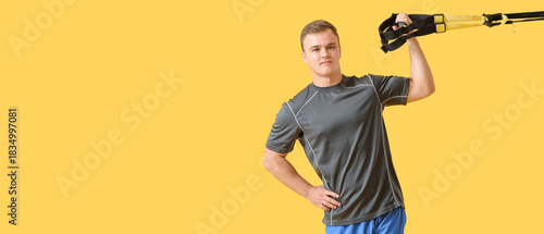 Sporty young man training w...